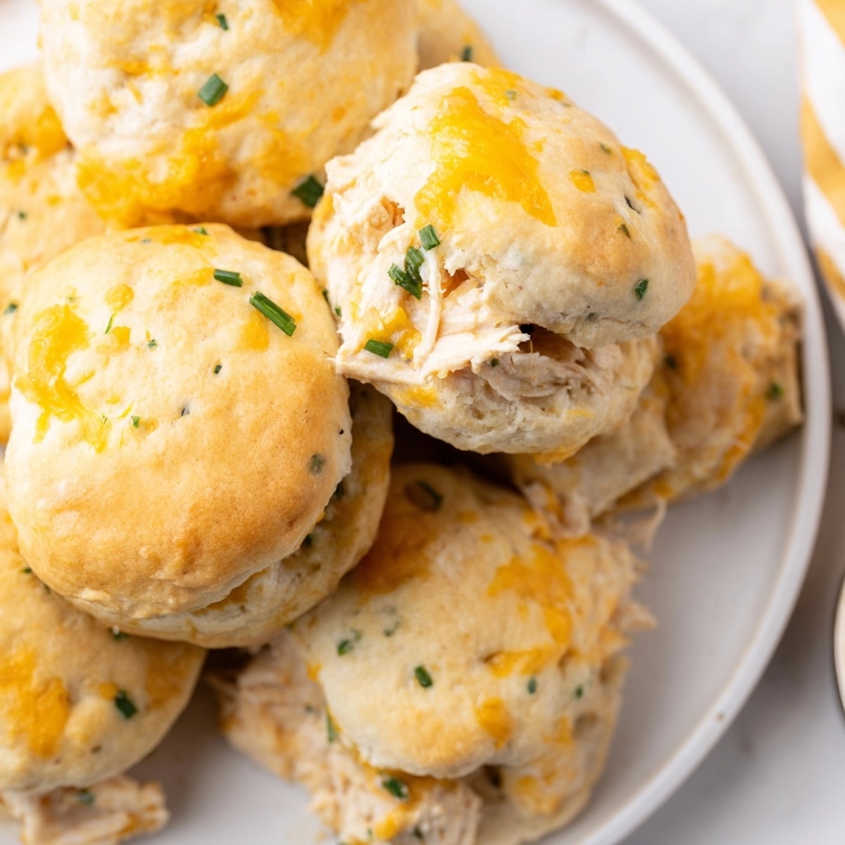 Golden brown Ranch Chicken Biscuit Poppers, warm from the oven, ready for dipping.