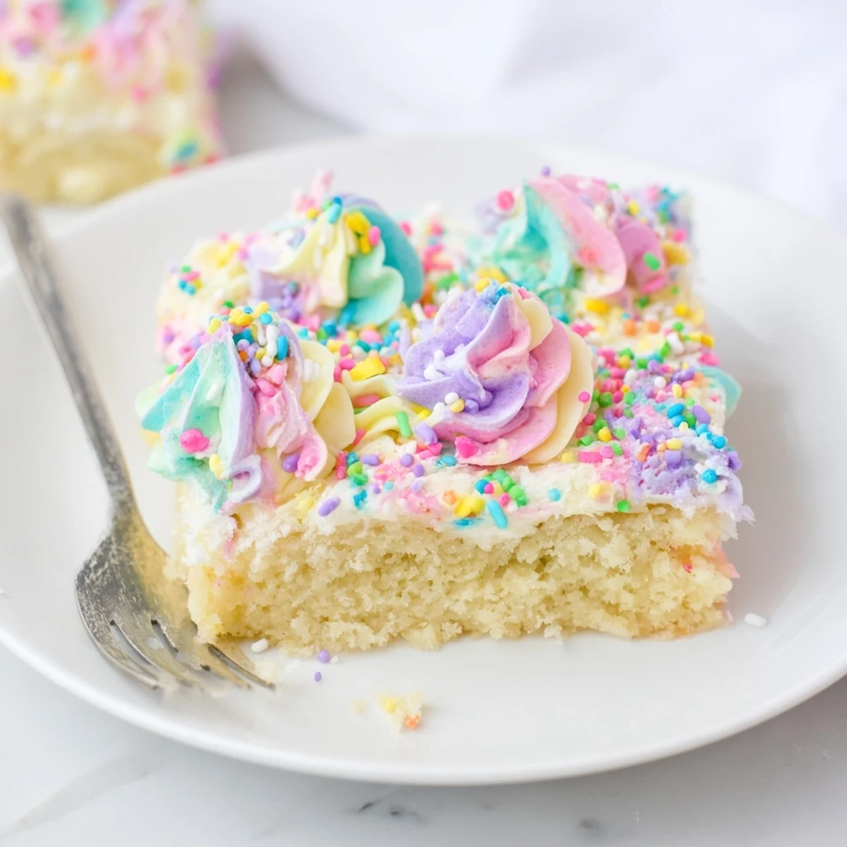Delightful homemade Not-So-Perfect Birthday Sheet Cake, vibrant frosting and festive sprinkles adorn.  