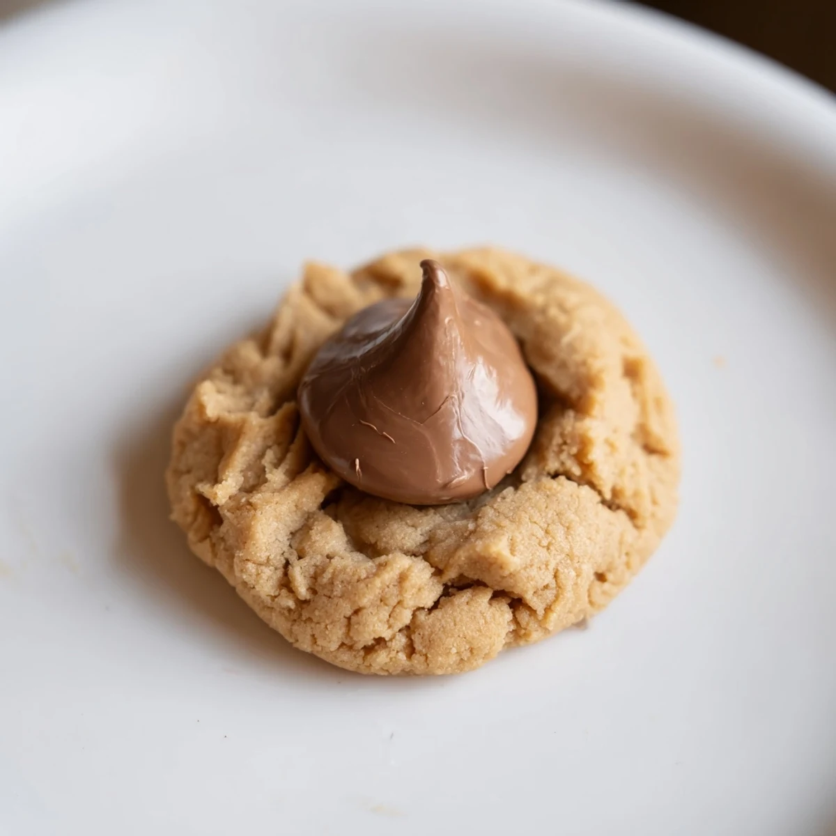 Close-up of delightful 3-Ingredient Peanut Butter Blossoms, sweet and simple, waiting to be enjoyed.