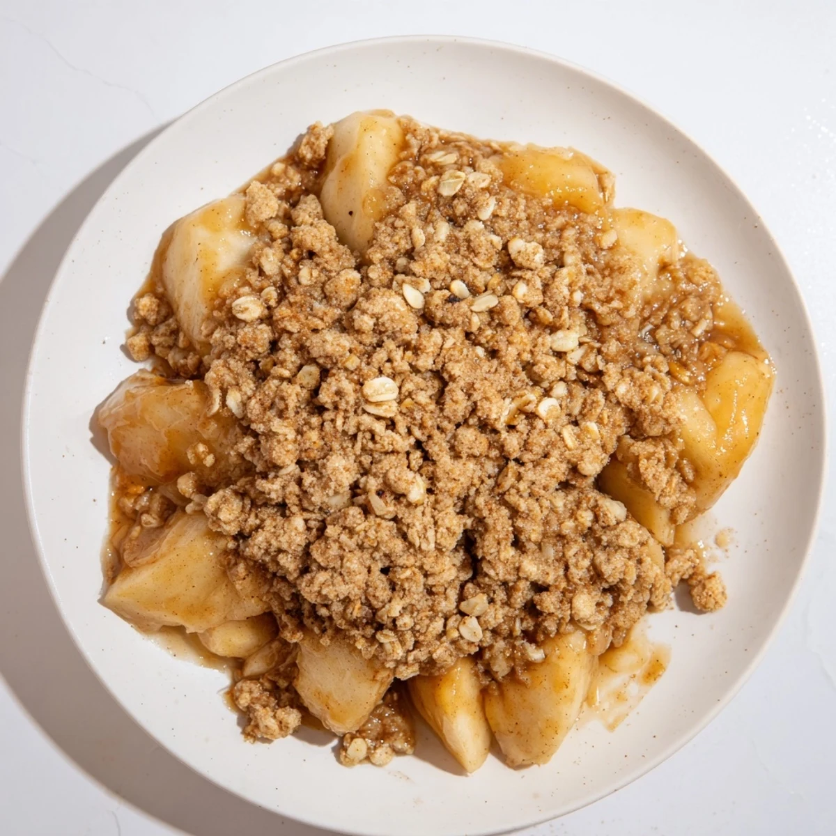 Golden-brown Best Apple Crisp bubbling with tender apples, perfect with vanilla ice cream.