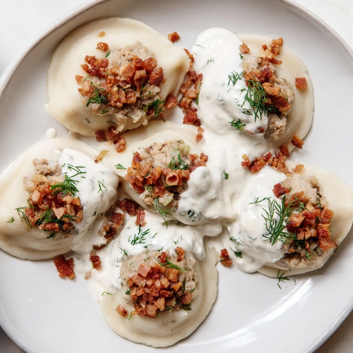 The rich aroma of Lithuanian Cepelinai fills the air as they simmer in boiling water with a meat filling.