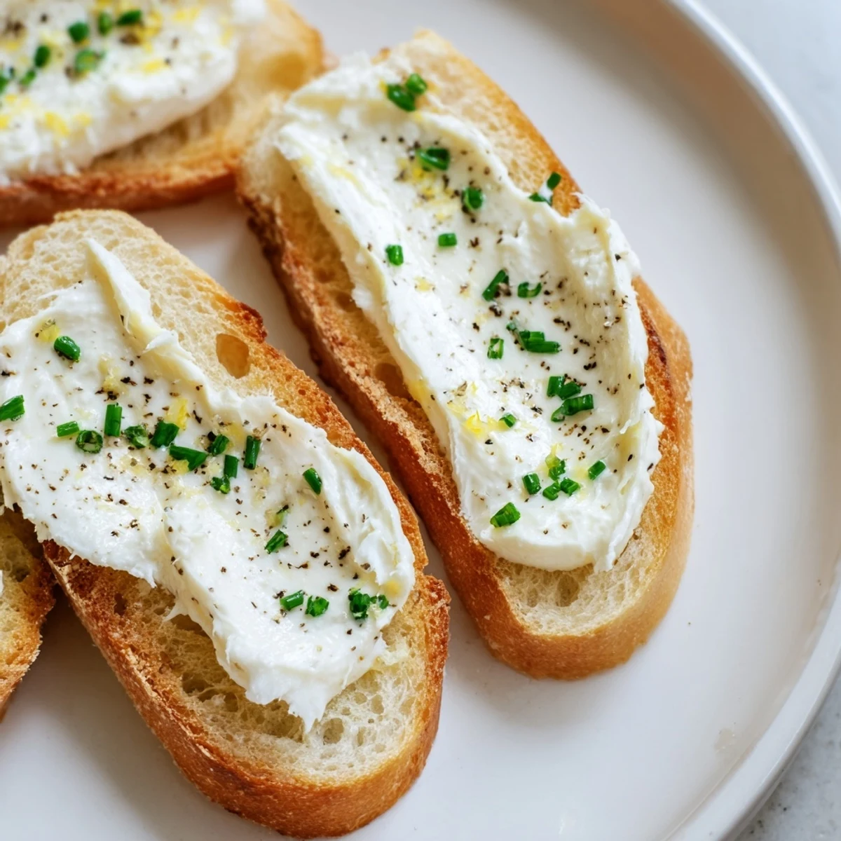 These beautiful Vodka Butter Crostini showcase golden-brown baguette slices, perfectly toasted and ready.