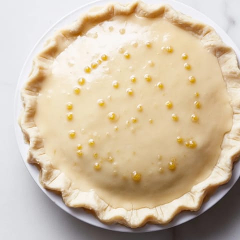 This delicious Water Pie is served chilled, a creamy dessert perfect for a light, refreshing treat.