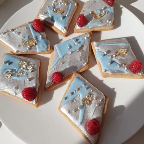 Delicate diamond-shaped cookies arranged on the Engagement Ring Diamond Dessert Tray, offering a sweet visual treat.