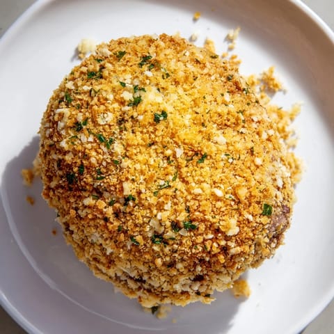 A close-up shows the delightful texture of freshly fried Dutch croquettes, perfect snacks.