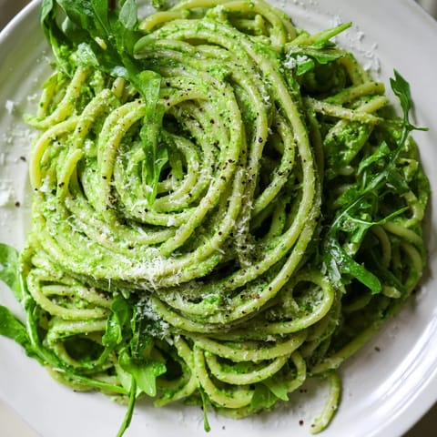 Freshly blended arugula and cottage cheese create a bright, peppery pesto for this simple, protein-packed linguine recipe.