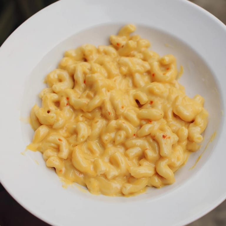 Golden, bubbly one-pot butternut squash mac & cheese: creamy pasta and squash blended into a delicious dinner.