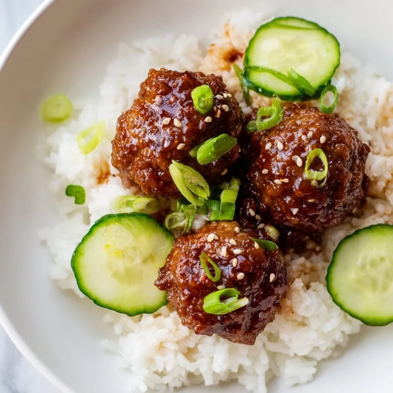 Easy-to-make teriyaki meatball bowls ready to enjoy with savory meatballs and a luscious teriyaki sauce.